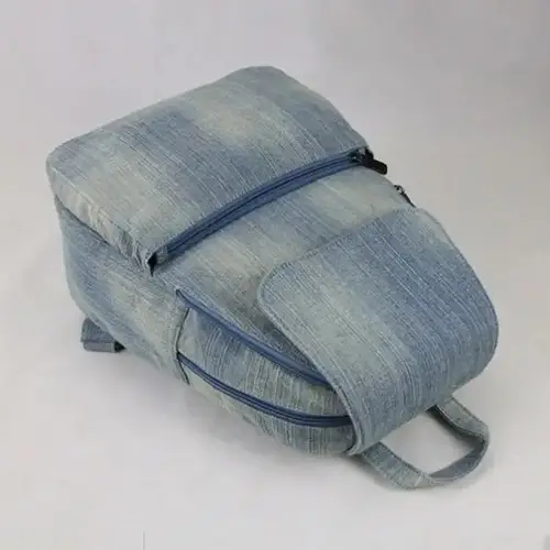  Compact Denim Backpack with Functional Design